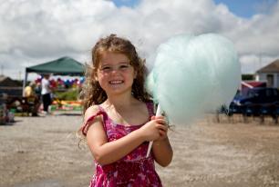 Kensa holds up her huge blue candy floss at Hayle Celebration Day 2016 Kensa holds up her huge blue candy floss at Hayle Celebration Day 2016